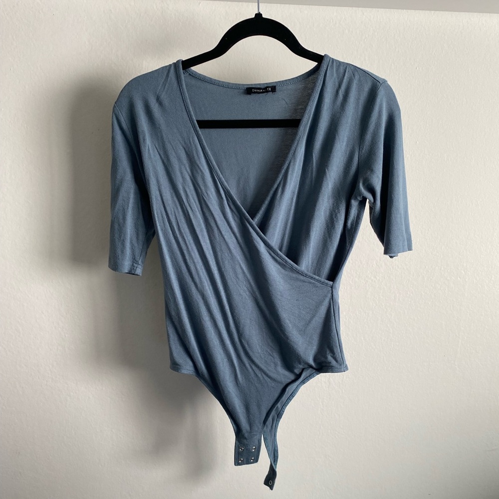 Dynamite teal surplice wrap bodysuit